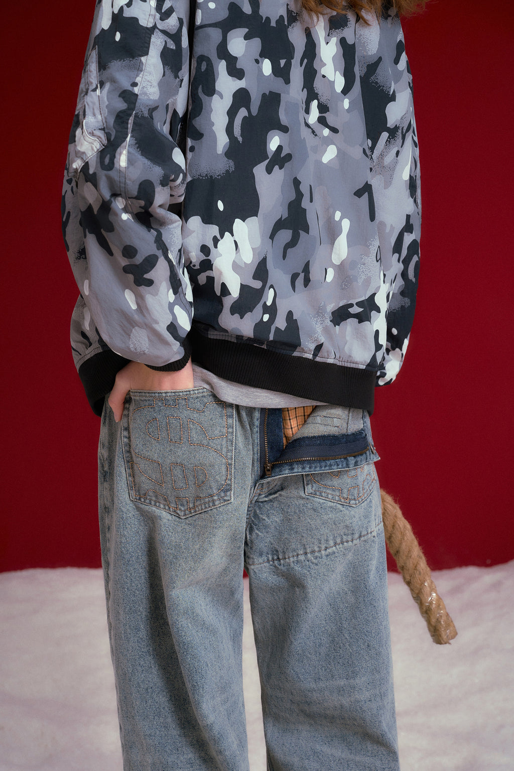 Underwear Denim worn on a female model, back view showing the waistband and pockets.