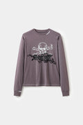 Front view of the purple Slub Flock Skull L/S Tee, with the skull graphic and raised black flock gothic lettering across the chest.