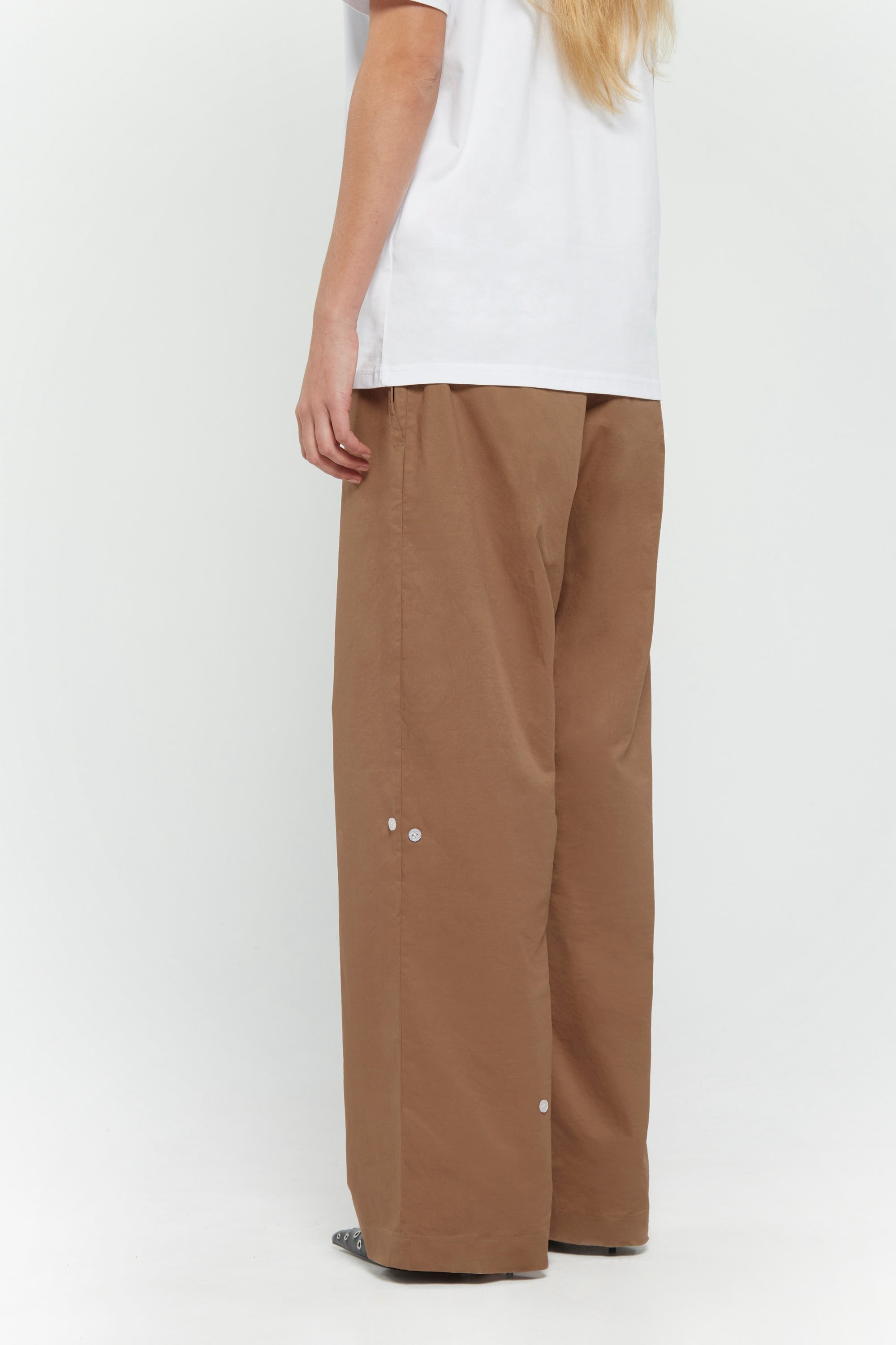 Beige cotton twill trousers with tailored straight fit and SSSTUFFF button detailing on legs