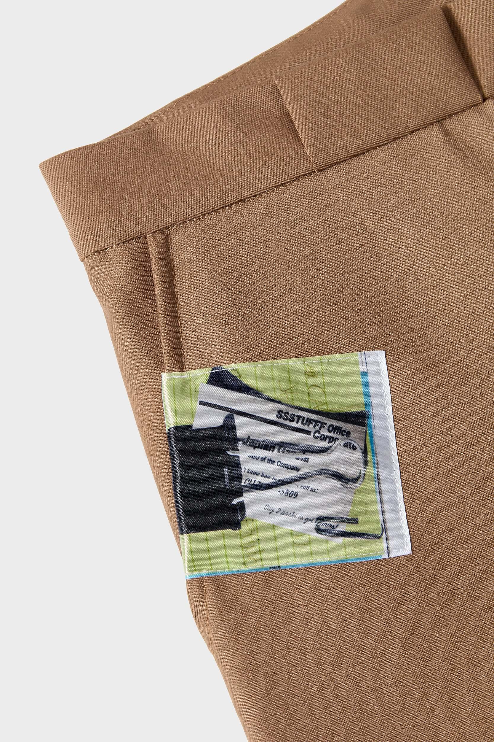 Beige cotton twill trousers with tailored straight fit and SSSTUFFF button detailing on legs