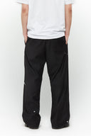 Black cotton twill trousers with tailored straight fit and SSSTUFFF button detailing on legs