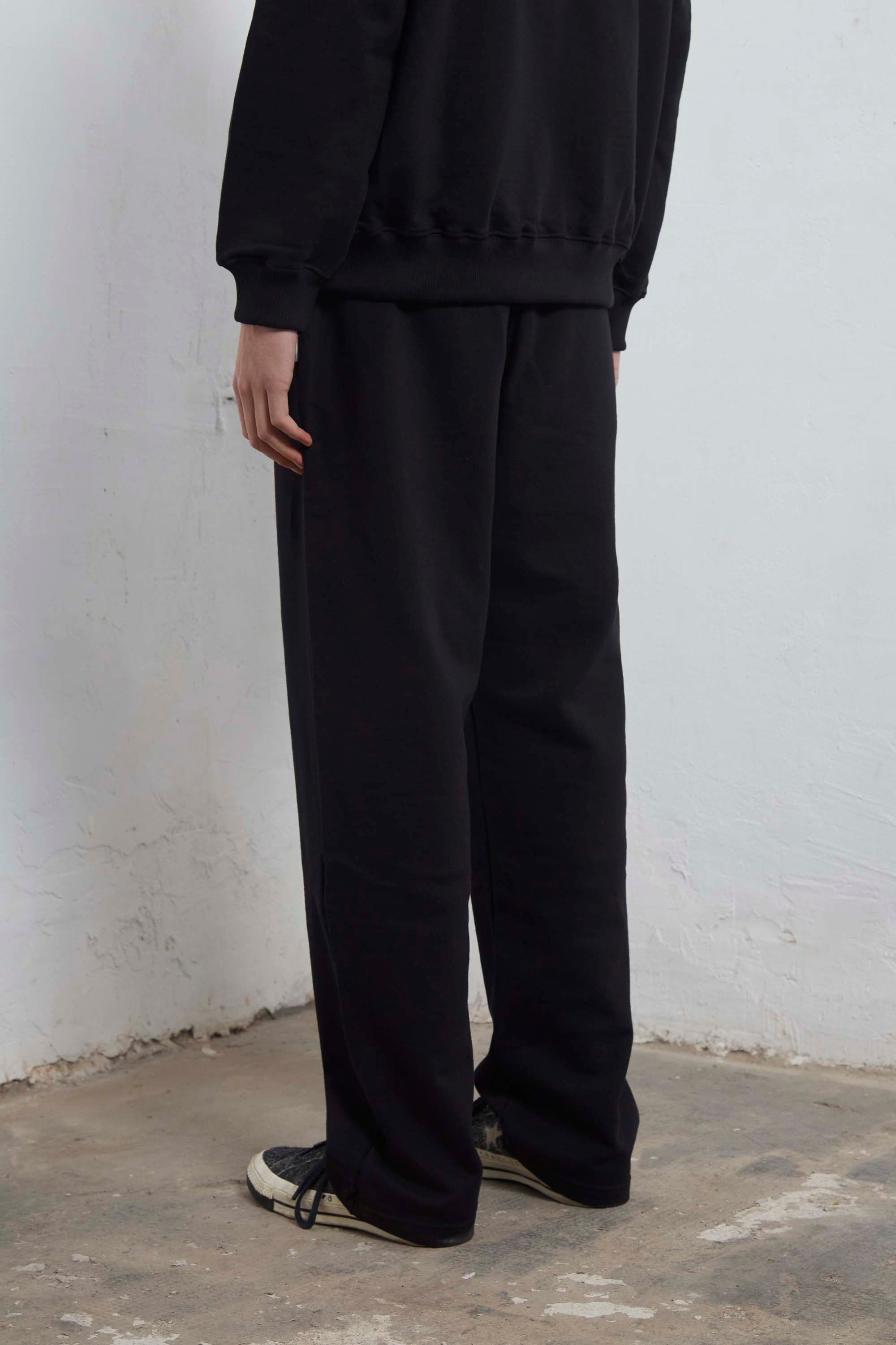 Black sweatpants with mini logo detail and drawstring waist