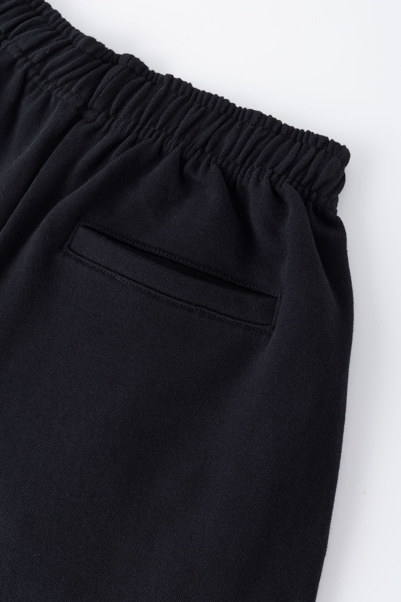 Black sweatpants with mini logo detail and drawstring waist