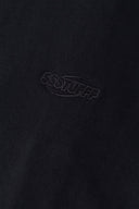 Black zip-up hoodie with embroidered mini logo on the back