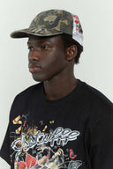 Camo cotton cap with missing cat jacquard patch and handcrafted cat scratches and footprints