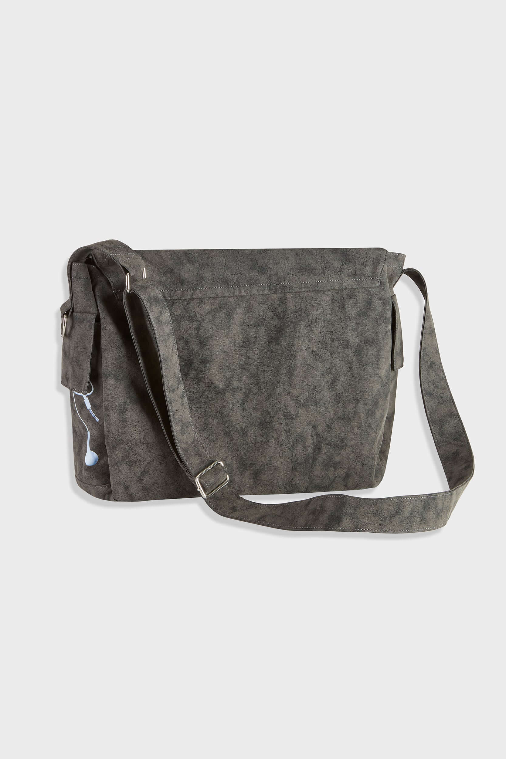 Messenger bag with UV printed charm graphics, adjustable strap, and keychain details