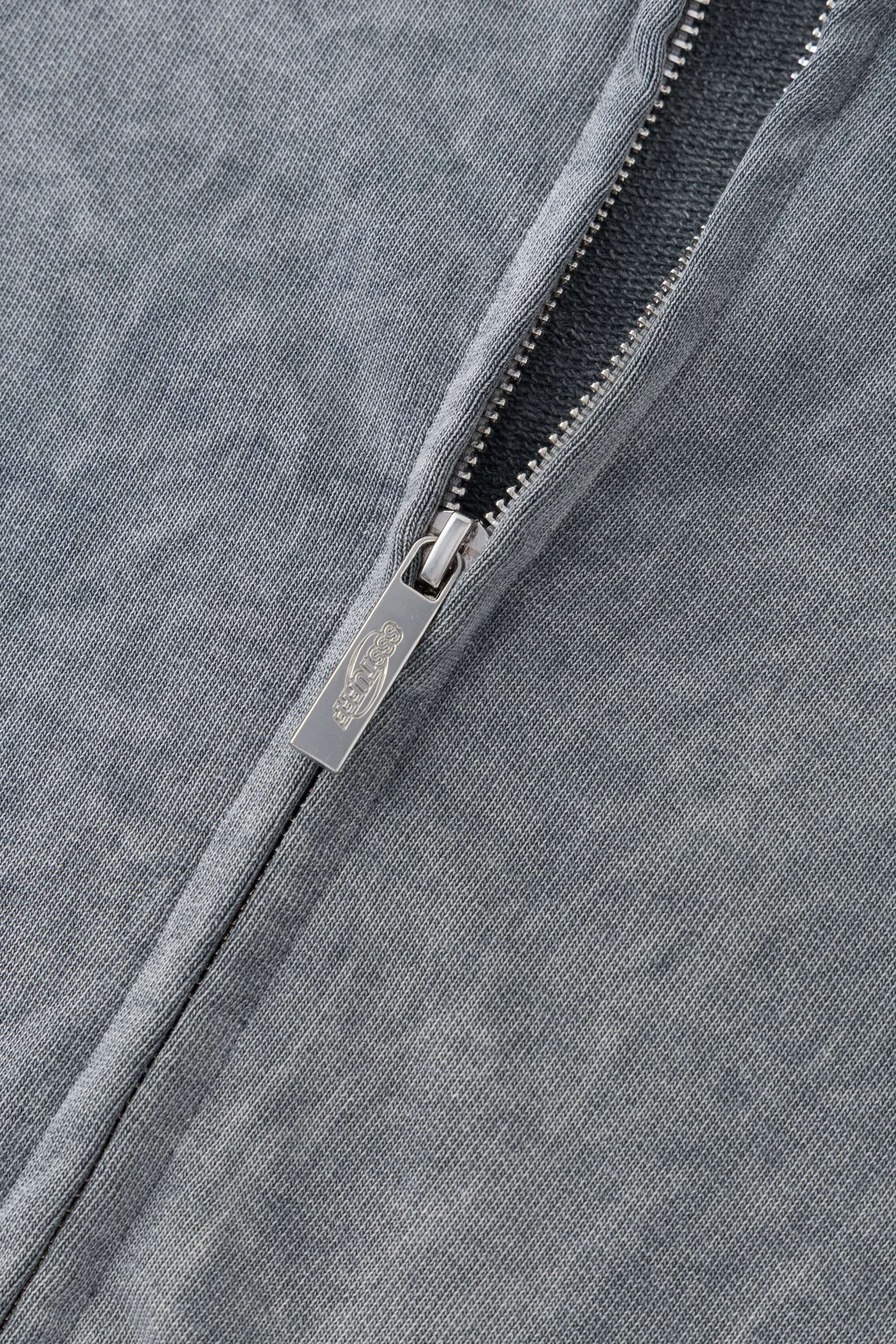 Grey zip-up hoodie with embroidered mini logo on the back