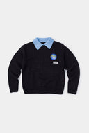 Black knit sweater designed to look like a shirt, with blue collar and attachable name tag and employee of the month pin