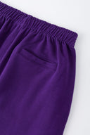 Purple sweatpants with mini logo detail and drawstring waist