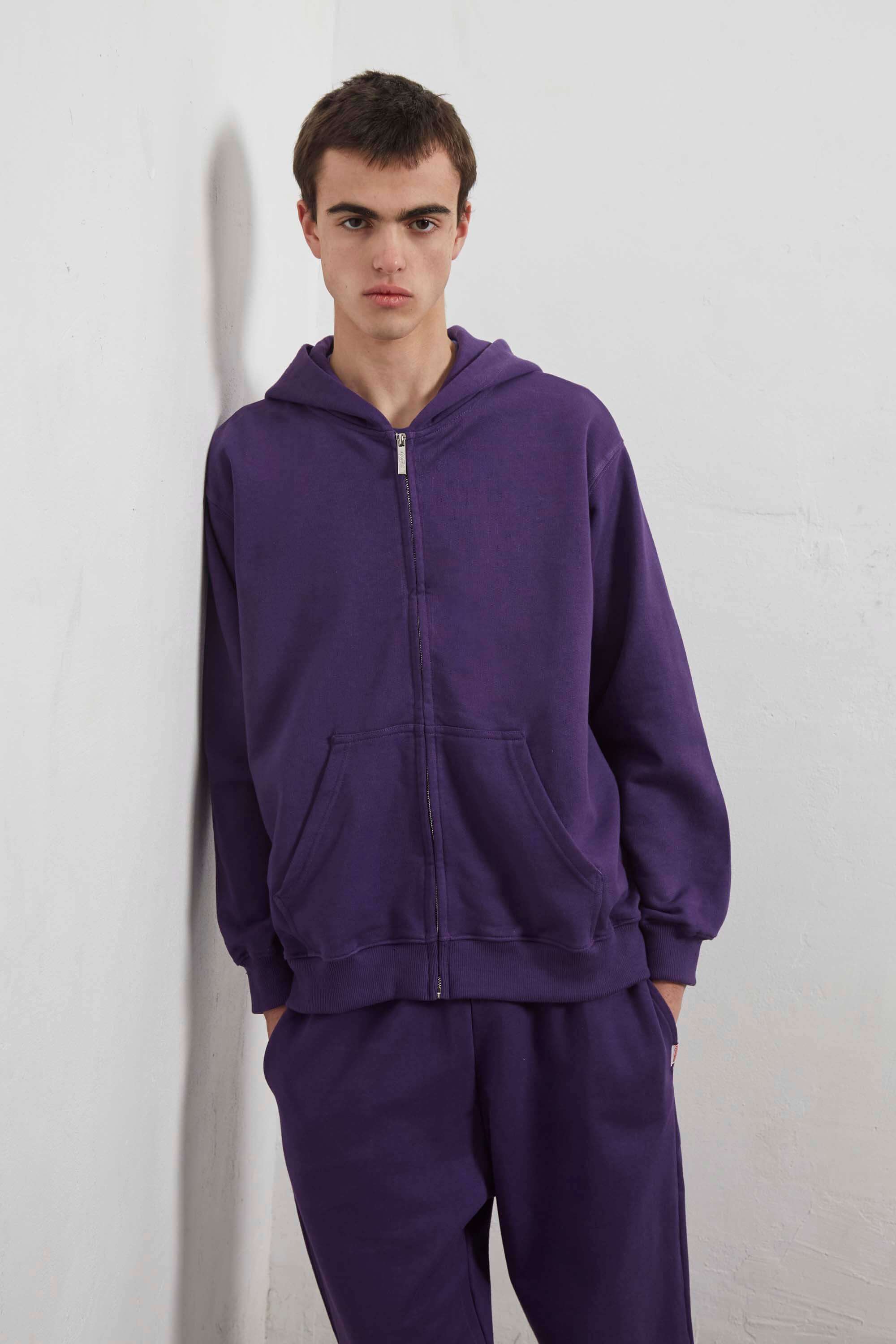Purple zip-up hoodie with embroidered mini logo on the back