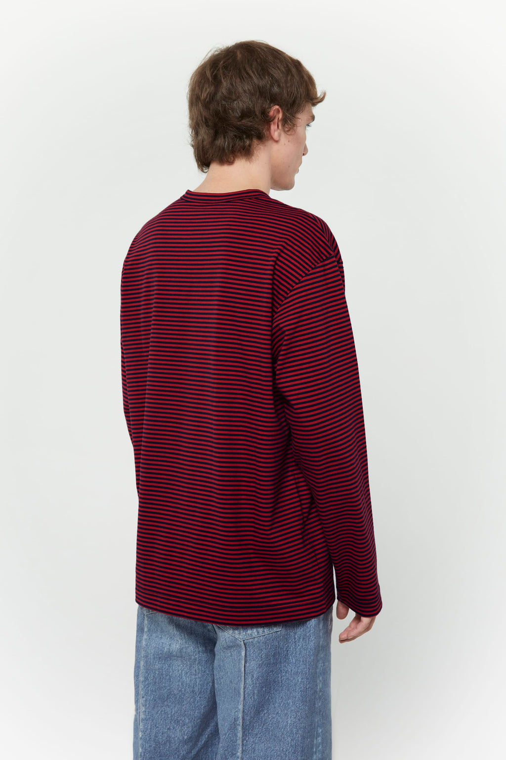 Red and black striped long-sleeve shirt with skull graphic and collage letter logo screenprint
