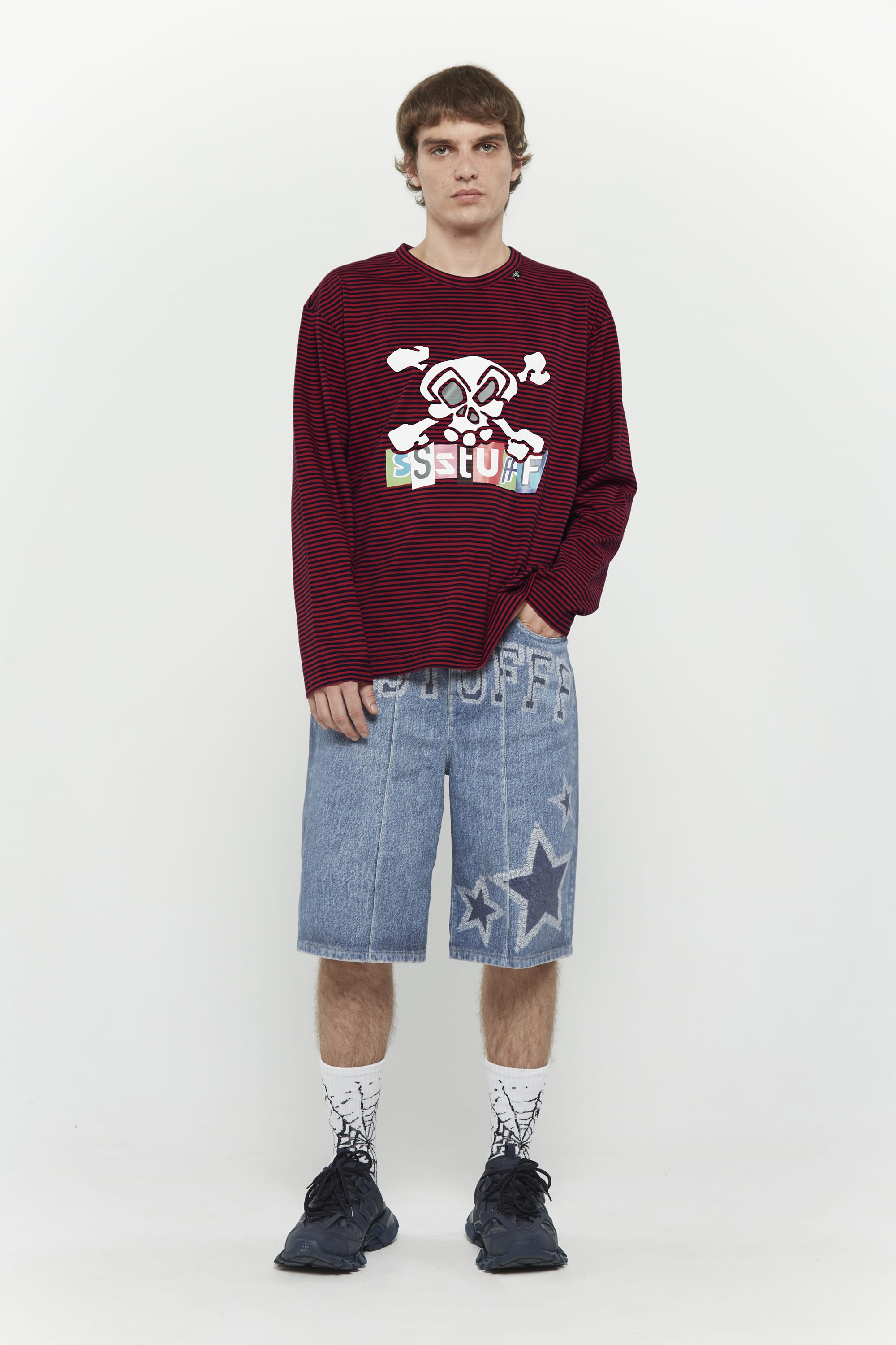 Red and black striped long-sleeve shirt with skull graphic and collage letter logo screenprint