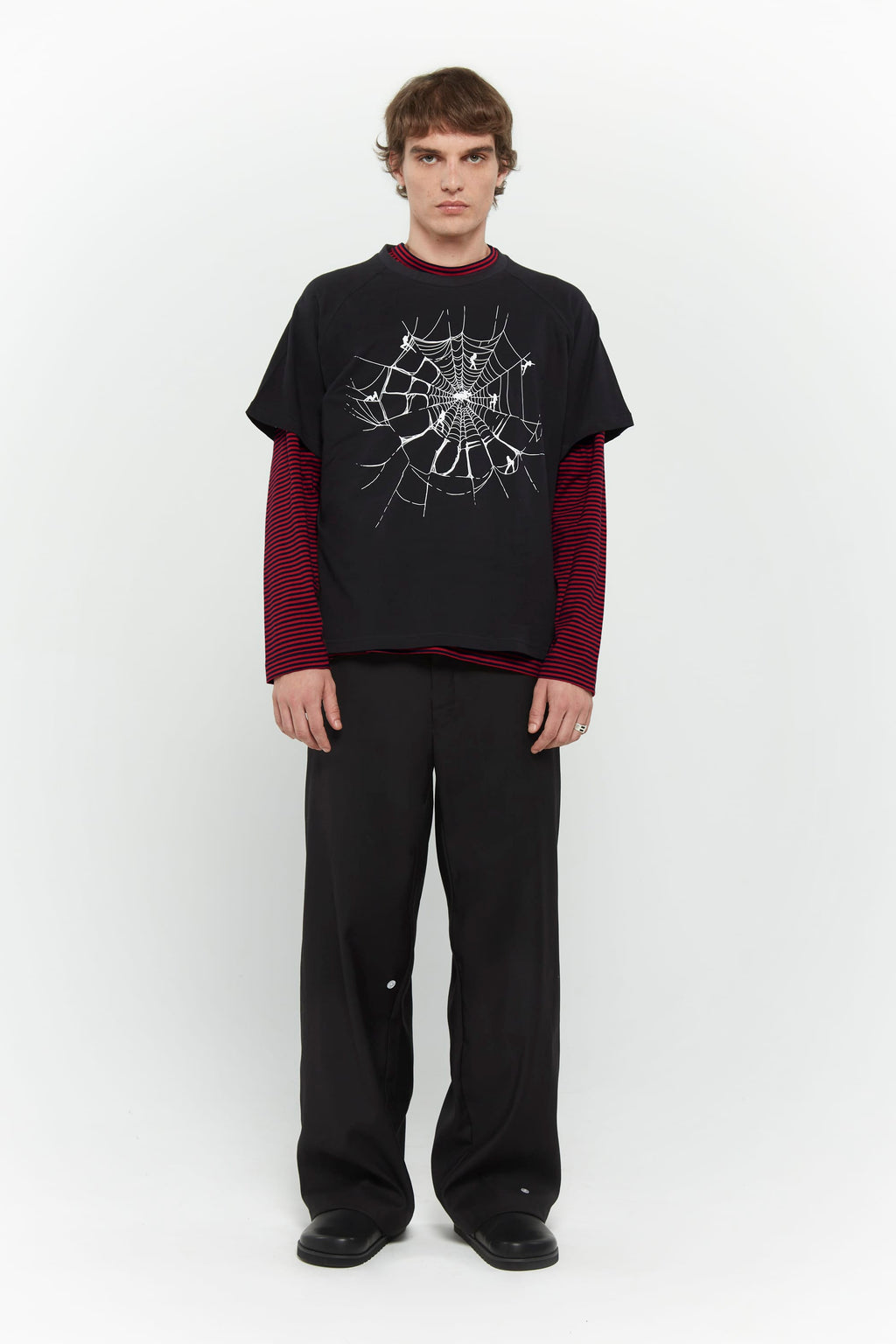 Layered red and black striped long-sleeve shirt with skull graphic and collage letter logo screenprint
