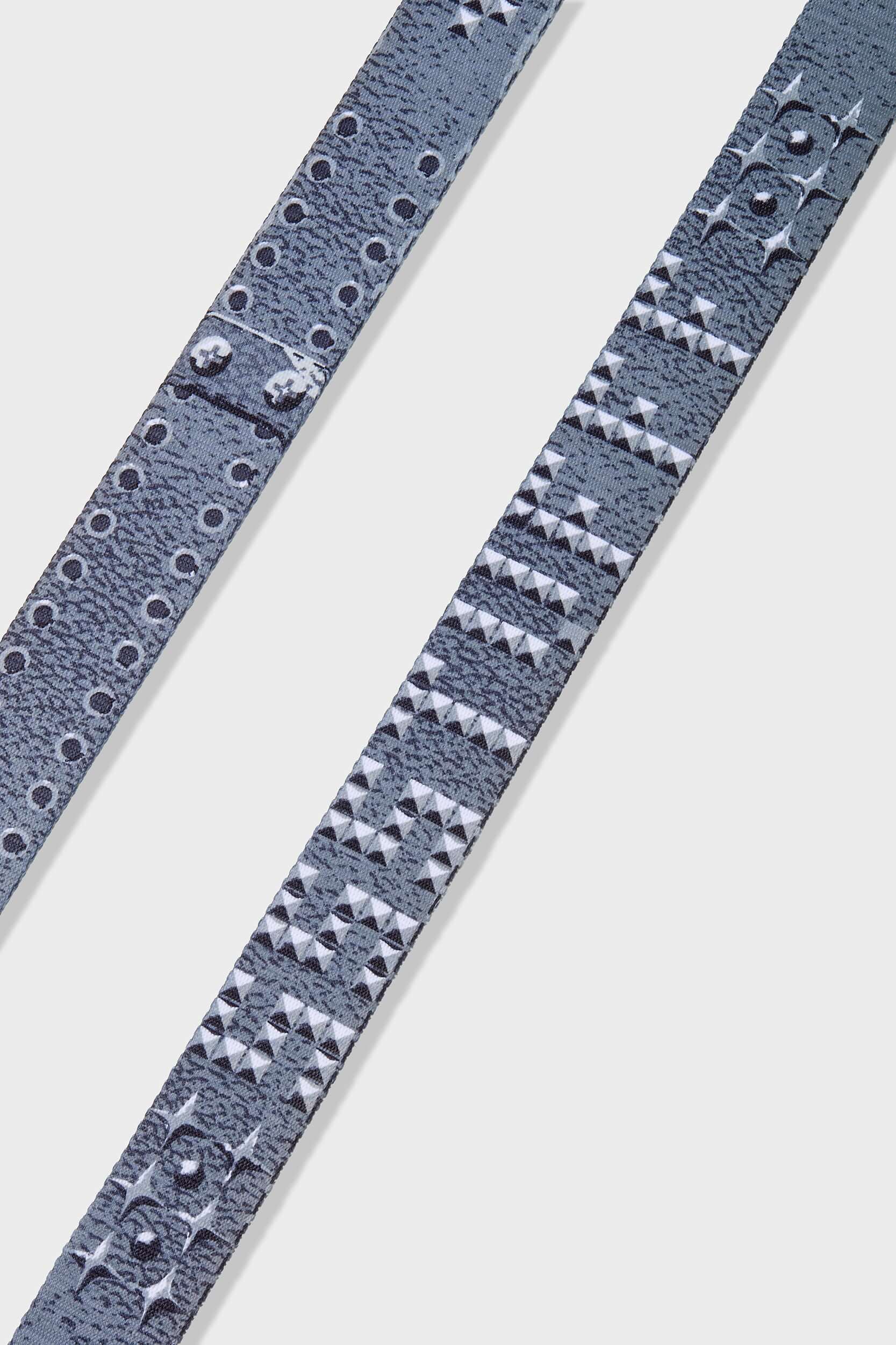 Canvas belt with printed rivets, metallic detailing, and SSSTUFFF engraved adjustable buckle