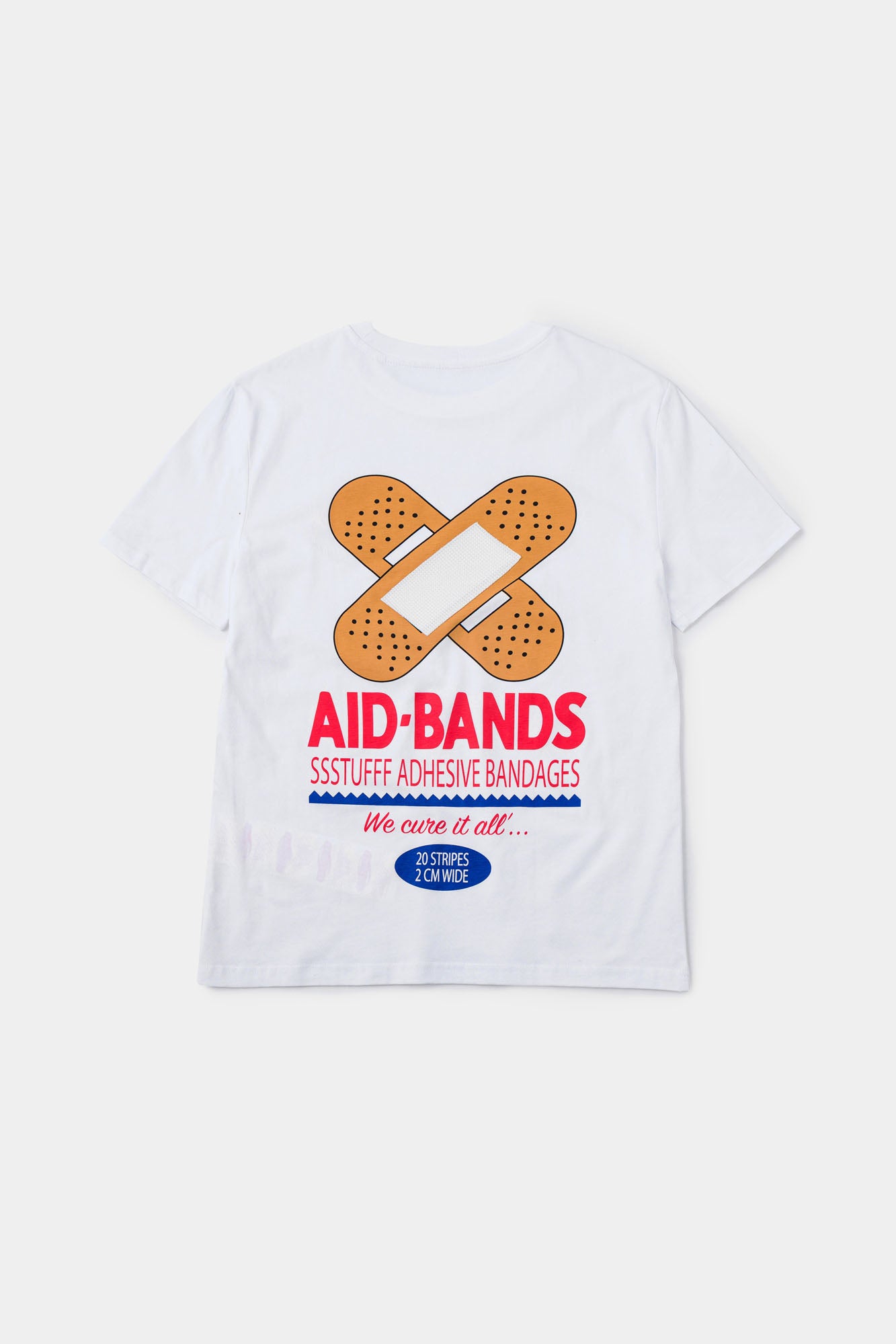 White t-shirt with bandaid graphic and text on a white background
