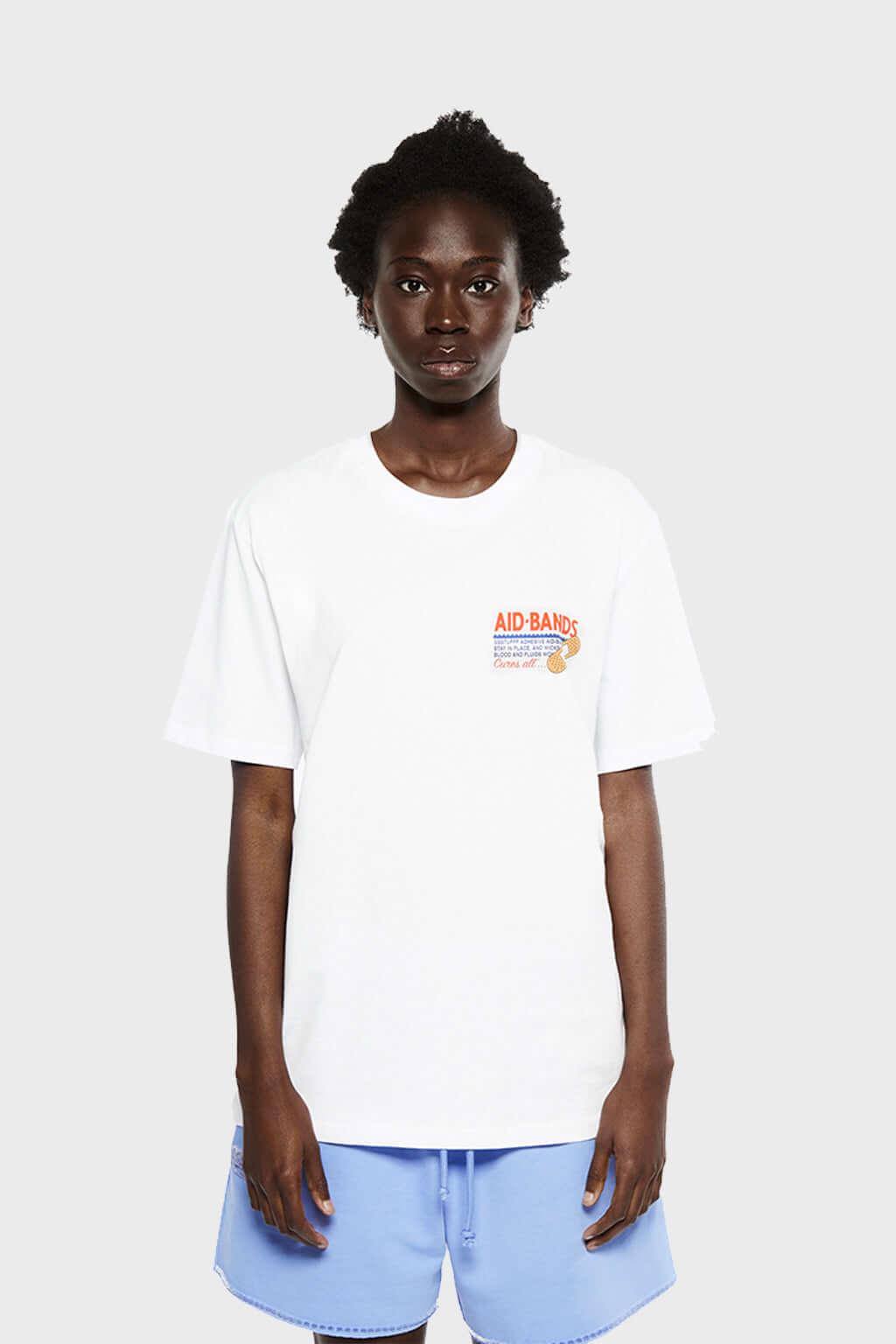 White t-shirt with bandaid graphic and text on a white background