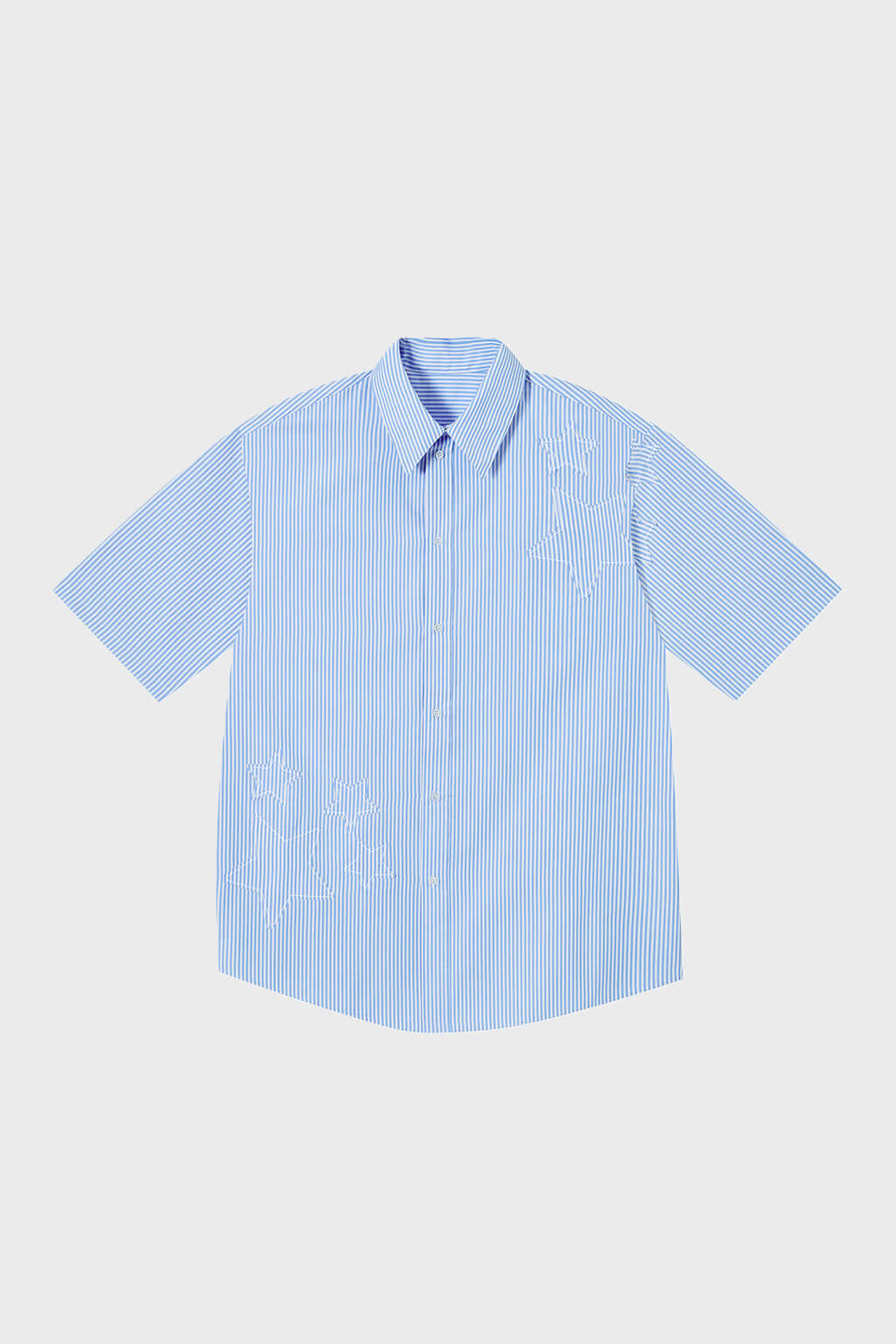 Blue short-sleeved button-up shirt with a pattern of stars and stripes on the chest area.