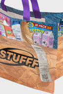 A multicolor grocery bag with 'SSSTUFF' printed on it and equipped with two strong cotton handles.