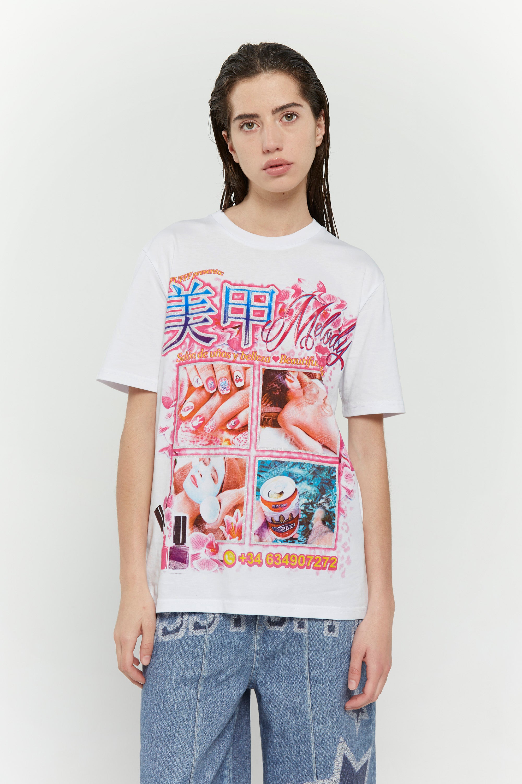 White t-shirt with shiny nail art graphic and beauty text