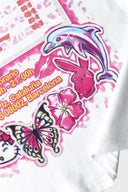 White t-shirt with shiny nail art graphic and beauty text