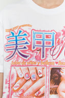 White t-shirt with shiny nail art graphic and beauty text