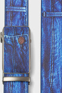 A printed PU leather belt with a slideable adjust and button release, featuring a denim emulated print.