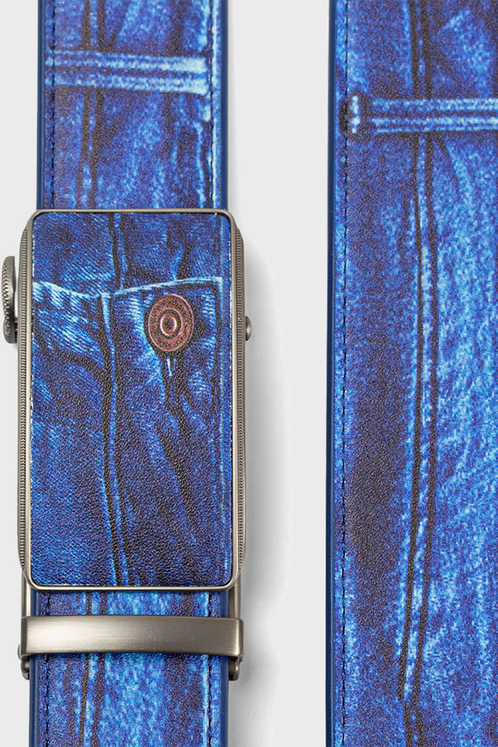 A printed PU leather belt with a slideable adjust and button release, featuring a denim emulated print.