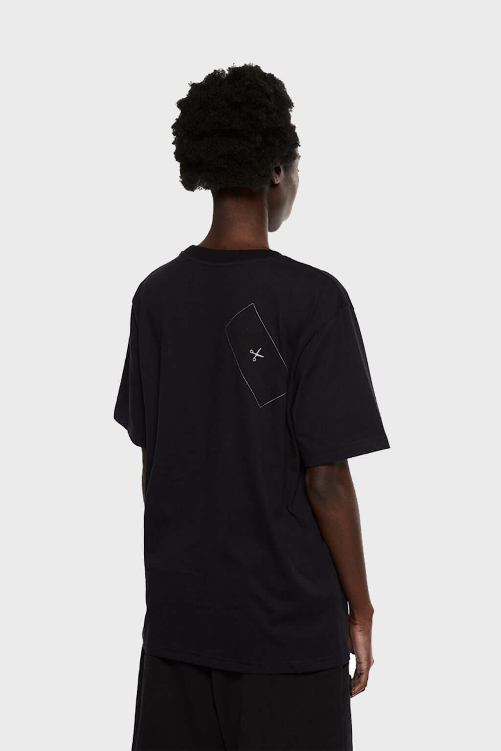 Black t-shirt with Operation game graphic and cuttable stitched zones