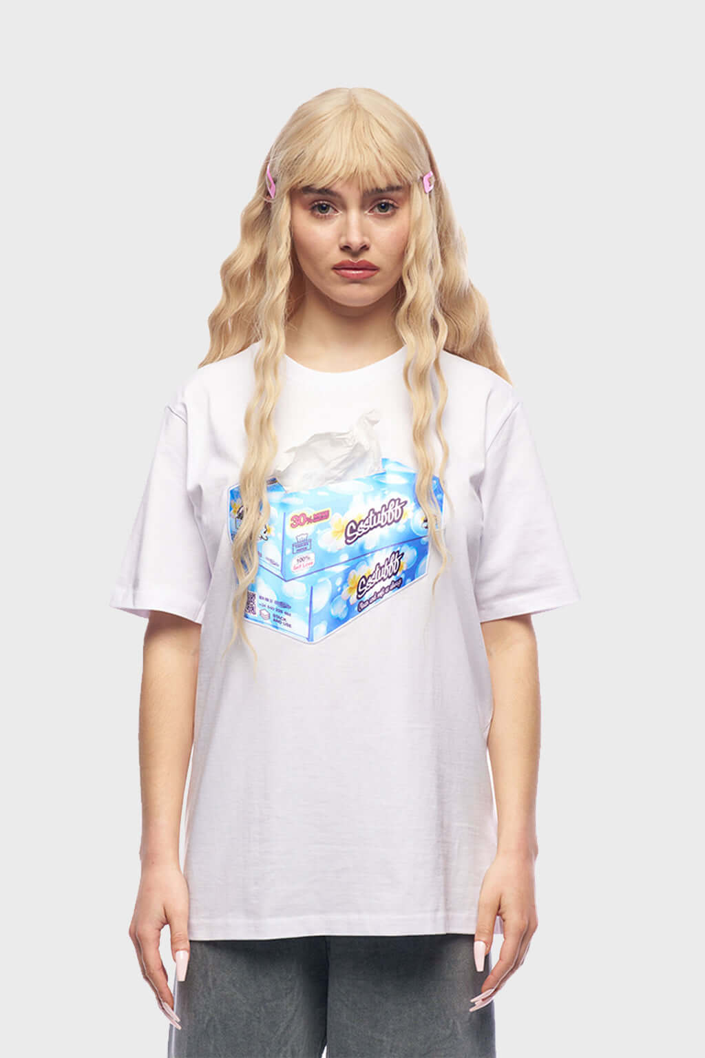 White or black t-shirt with embroidered tissue box patch on chest and functional tissue paper dispenser