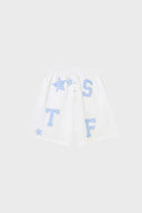 A pair of white shorts with blue striped stars and patchwork details.