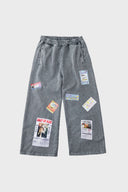 Oversized wide trousers with hand-sewn and applied vintage advertisement patches