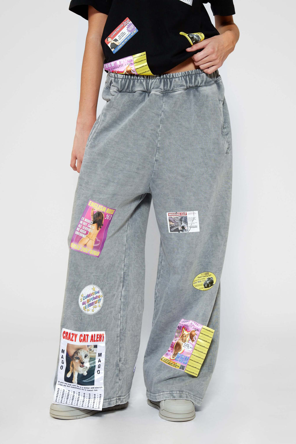 Oversized wide trousers with hand-sewn and applied vintage advertisement patches