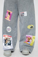 Oversized wide trousers with hand-sewn and applied vintage advertisement patches