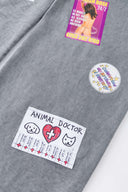 Oversized wide trousers with hand-sewn and applied vintage advertisement patches