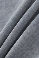 Oversized wide trousers with hand-sewn and applied vintage advertisement patches