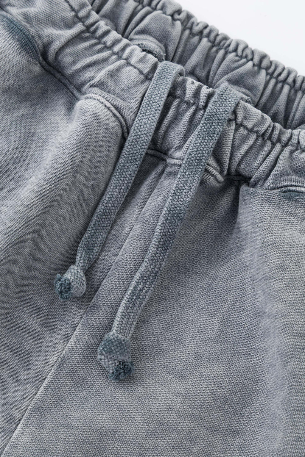 Oversized wide trousers with hand-sewn and applied vintage advertisement patches