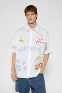 White shirt with jacquard, vinyl, and sublimated birthday postcard graphics inspired by greeting cards