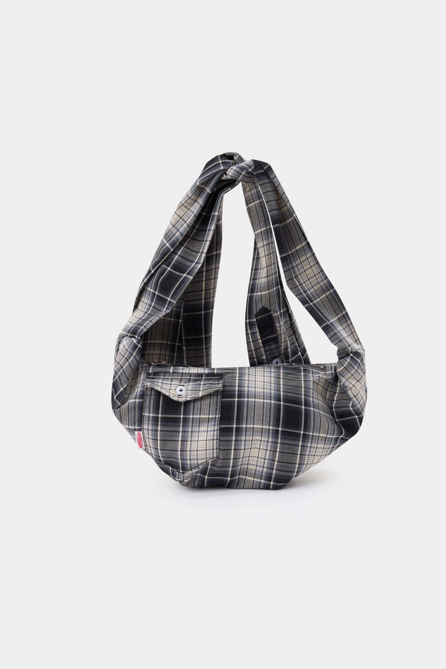 Black and white checked croissant-shaped mini bag with shirt texture and adjustable sleeve handles for shoulder or crossbody wear