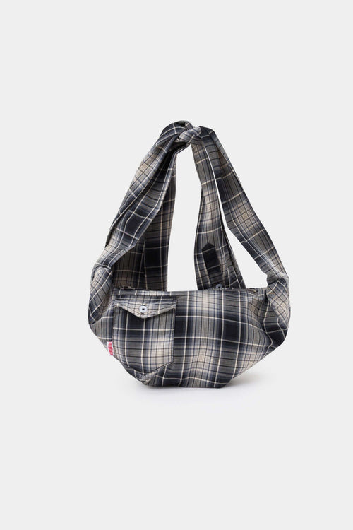 Black and white checked croissant-shaped mini bag with shirt texture and adjustable sleeve handles for shoulder or crossbody wear