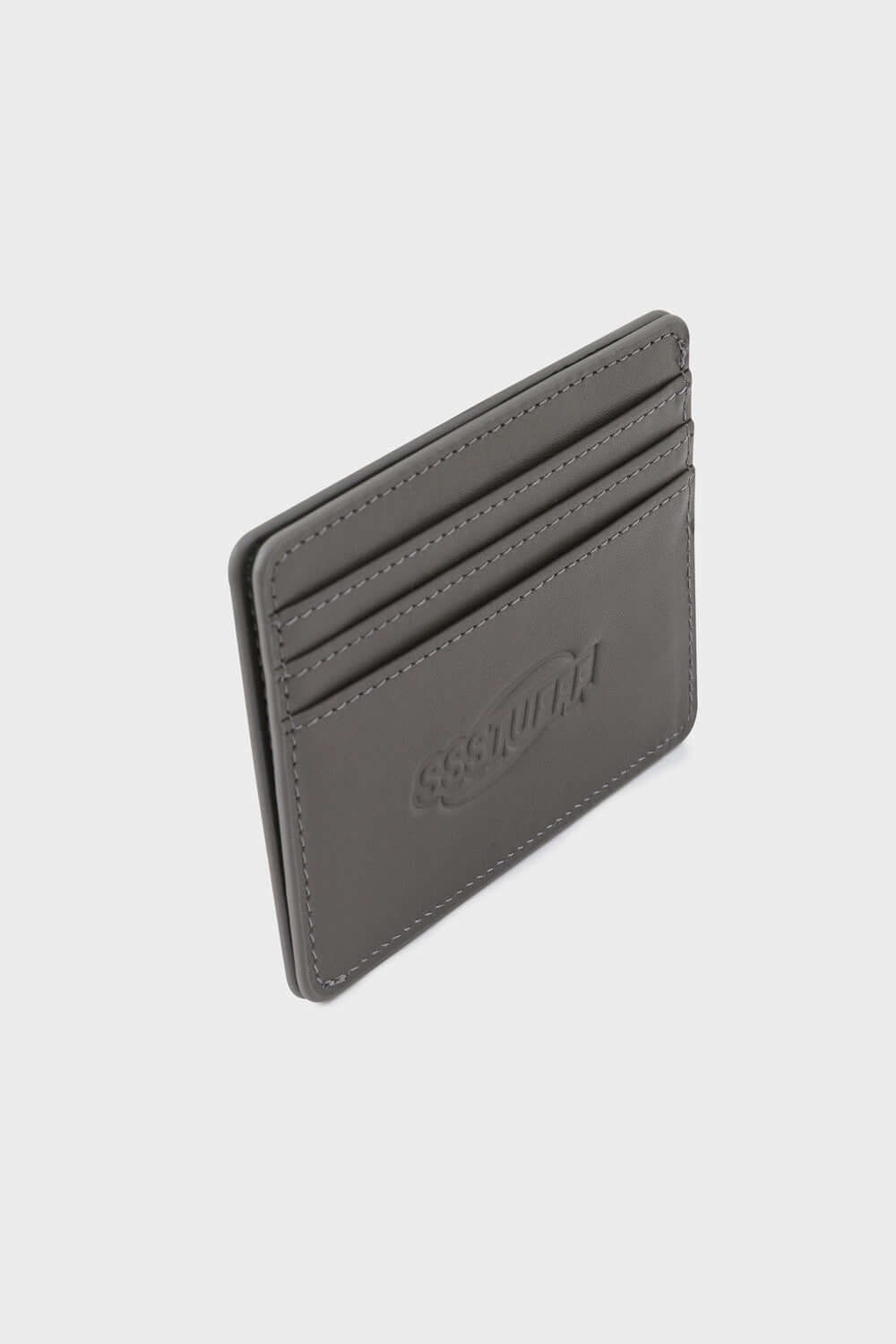 Leather card holder with retro cassette tape artwork and embossed SSSTUFFF logo