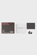 Leather card holder with retro cassette tape artwork and embossed SSSTUFFF logo