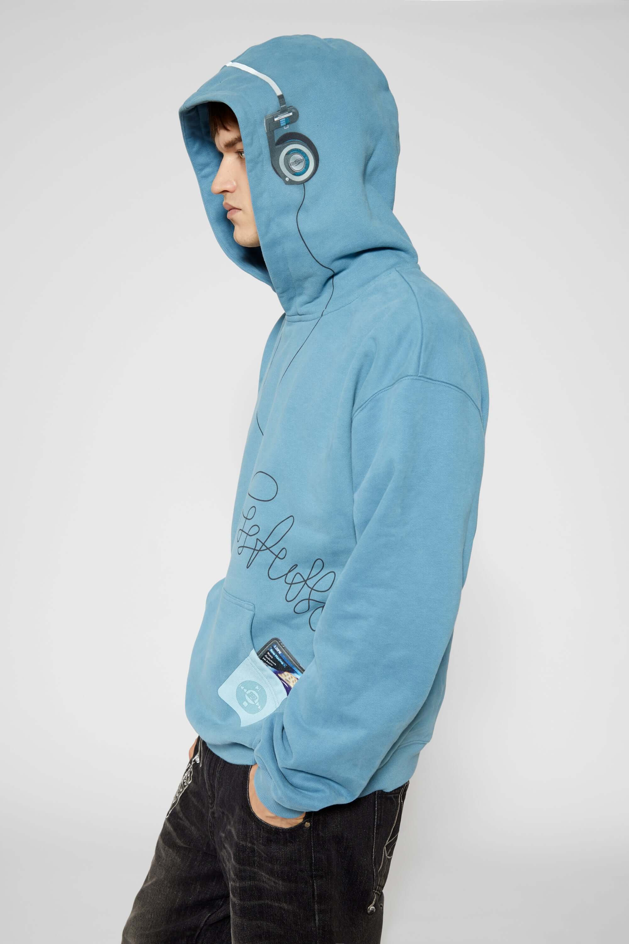 Blue hoodie with digital print of classic headphones and MP3 player extending from hood to front pocket