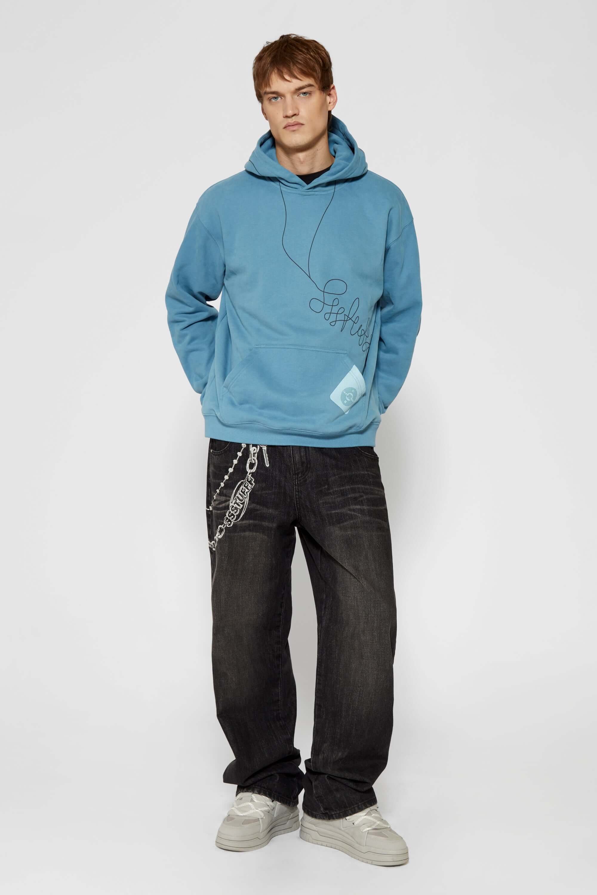 Blue hoodie with digital print of classic headphones and MP3 player extending from hood to front pocket