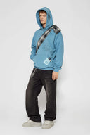 Blue hoodie with digital print of classic headphones and MP3 player extending from hood to front pocket