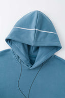 Blue hoodie with digital print of classic headphones and MP3 player extending from hood to front pocket