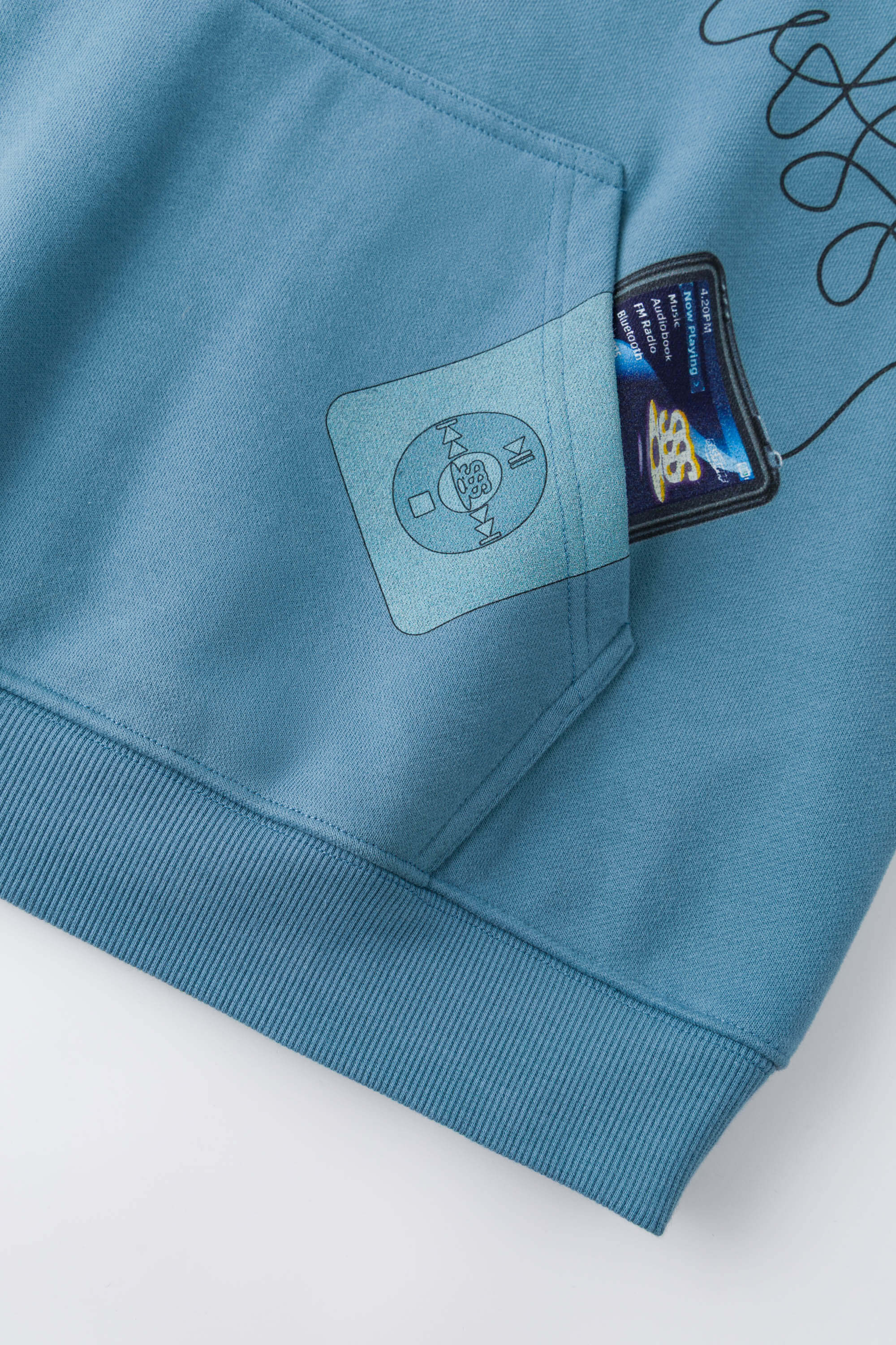 Blue hoodie with digital print of classic headphones and MP3 player extending from hood to front pocket