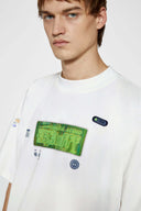 White oversized t-shirt with cyberpunk digital audio stereo interface print, TPU buttons, and holographic SSSTUFFF motif