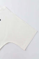 White oversized t-shirt with cyberpunk digital audio stereo interface print, TPU buttons, and holographic SSSTUFFF motif