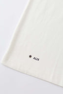 White oversized t-shirt with cyberpunk digital audio stereo interface print, TPU buttons, and holographic SSSTUFFF motif