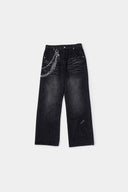 Black wash denim jeans with embroidered keychain, carabiner, and earphone charm details, and pin embroidery on ankle